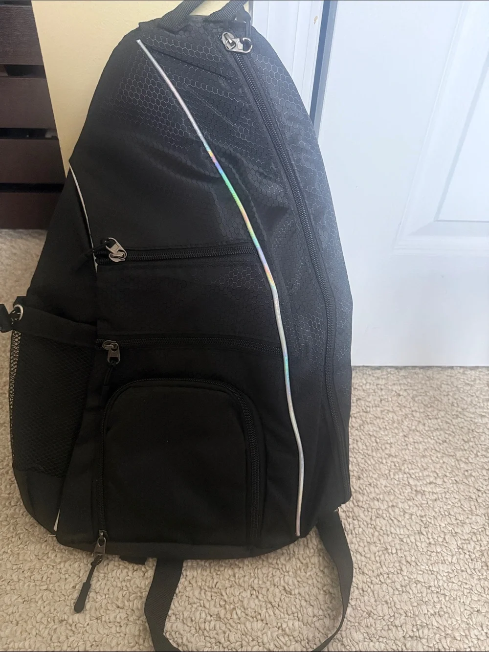 New Women/Men's Black sling pickleball Backpack with Reflective Trim.